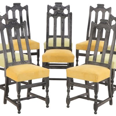 TEN DARK CERUSED OAK DINING CHAIRS IN THE MANNER OF JAMES MONT C 1960.