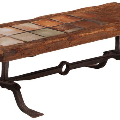 A FRENCH BRUTALIST COFFEE TABLE HAVING AN IRON BASE AND A THICK SLAB TOP MADE OF ELM WITH INSET