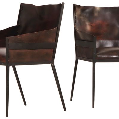 PAIR OF PAINTED IRON AND LEATHER ARM CHAIRS IN THE MANNER OF JEAN-MICHEL FRANK.