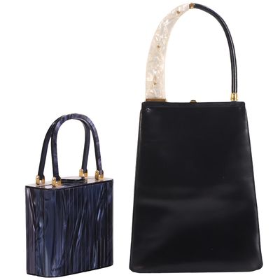 TWO VINTAGE HANDBAGS INCLUDING A BLACK LEATHER BAG WITH PEARLED ACRYLIC HANDLE BY HARRY ROSENFELD