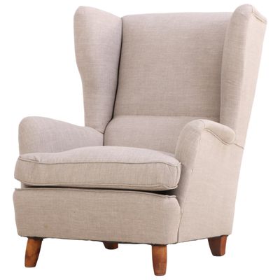 A DANISH STYLE UPHOLSTERED WING CHAIR C 1950 WITH RECENT FABRIC