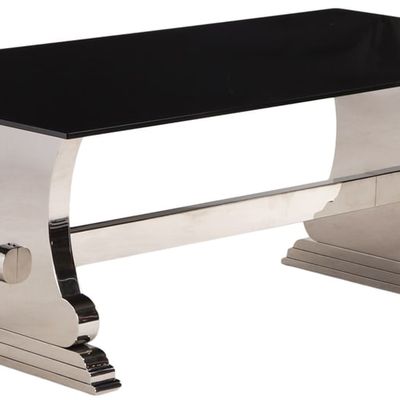 MODERN DINING TABLE HAVING A BLACK GLASS TOP RESTING ON A CHROMED METAL BASE.