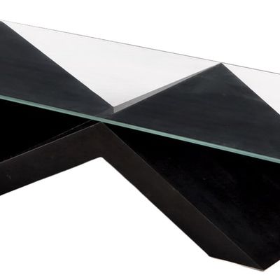 A SLEEK COFFEE TABLE HAVING A GEOMETRIC EBONIZED & LACQUERED WOOD BASE WITH A RECTANGULAR GLASS TOP.