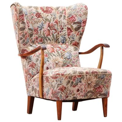 A SWEDISH OPEN ARM LOUNGE CHAIR C 1955.