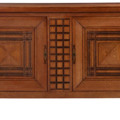 FRENCH TWO DOOR OAK SIDEBOARD IN THE MANNER OF CHARLES DUDOUYT C 1940 HAVING TWO INTERIOR