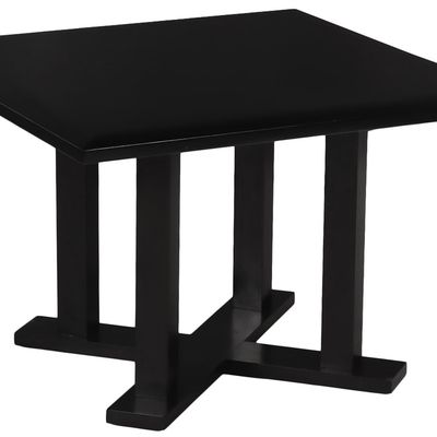 A SQUARE EBONIZED WOOD TABLE BY CHRISTIAN LIAIGRE.