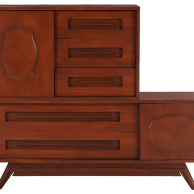 AN ASYMMETRIC WALNUT MID CENTURY MODERN DRESSER BY YOUNG MANUFACTURING.