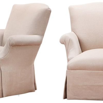 PAIR OF UPHOLSTERED LOUNGE CHAIRS THAT SWIVEL C 1950.