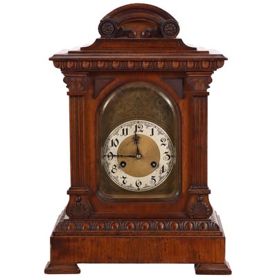CONTINENTAL BRACKET CLOCK HAVING CARVED WALNUT CASE C. 19TH CENTURY