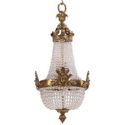 FRENCH EMPIRE STYLE BRASS AND CRYSTAL CHANDELIER C 1940 HAVING FEMALE MASKS,.