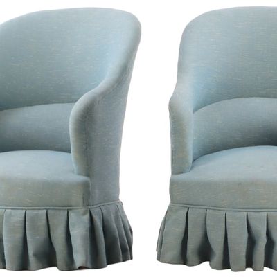 PAIR OF FRENCH UPHOLSTERED AND SKIRTED LOUNGE CHAIRS C 1920.