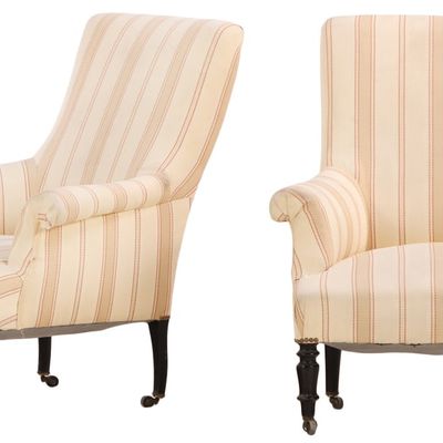 PAIR OF NAPOLEON III LIBRARY CHAIRS HAVING EBONIZED TURNED FEET C 1860.