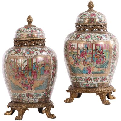 PAIR OF CHINESE BRONZE MOUNTED GINGER JARS HAVING ROSE MEDALLION PATTERN AND FOOTED BASES C LATE