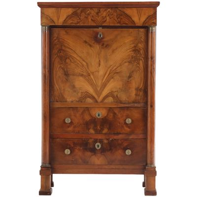 A FRENCH WALNUT SECRETARY ABATTANT C 1840 HAVING A HIGHLY FIGURED FRONT AND A FITTED INTERIOR.