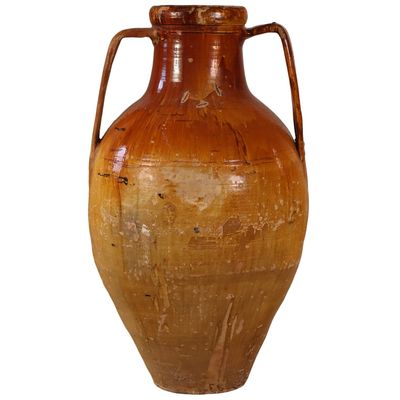 51" PARTIAL GLAZED TERRACOTTA VESSEL WITH HANDLES.