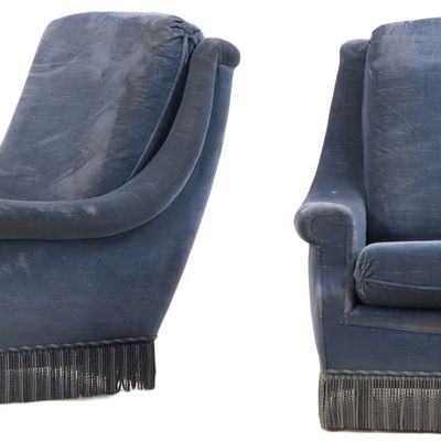 PAIR OF FRENCH UPHOLSTERED LOUNGE CHAIRS HAVING BRASS FEET AND FRINGE DECORATION C 1960.