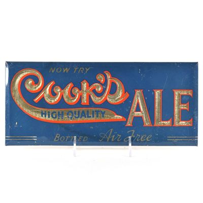Sale Photo Thumbnail #540: Cooks High Quality Ale 1930s Tin-Over-Cardboard Sign