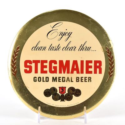 Sale Photo Thumbnail #584: Stegmaier Gold Medal Beer 1950s Tin-Over-Cardboard Button Sign