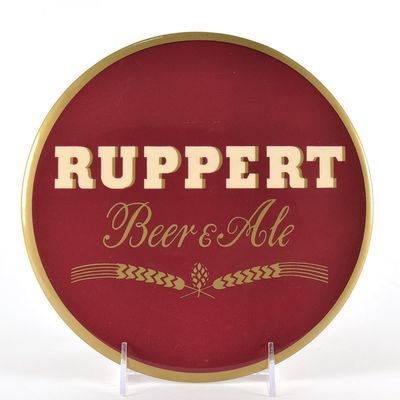 Sale Photo Thumbnail #579: Ruppert Beer and Ale 1940s Tin-Over-Cardboard Button Sign EXCEPTIONAL