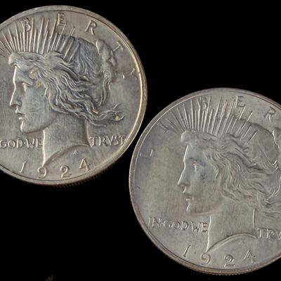 A Pair of 1924 US Silver Peace Dollars