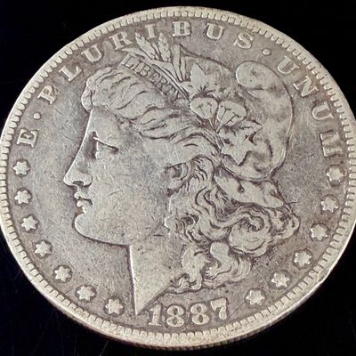 1887-O US Morgan Silver Dollar