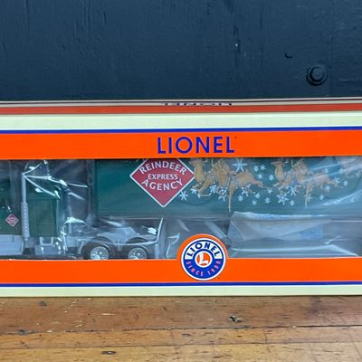 Sale Photo Thumbnail #132: Lionel 6-14260 O-Gauge Christmas Tractor and Trailer Set