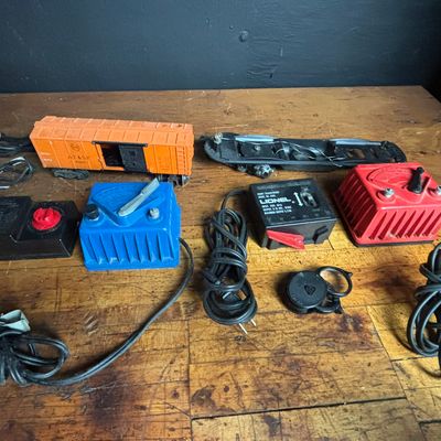 Sale Photo Thumbnail #200: An Assortment of Vintage Lionel and AHM O-Gauge Model Train Components and Transformers