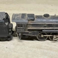 Sale Photo Thumbnail #112: A Pair of Lionel Postwar O27 Gauge Steam Locomotive No. 2026 and Whistle Tender No. 2466WX