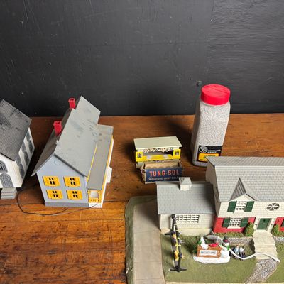 Sale Photo Thumbnail #195: An Assortment of O-Gauge Model Railroad Buildings and Scenery Accessories Including MTH Electric Trains and K-Line