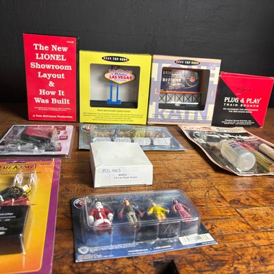 Sale Photo Thumbnail #197: A Collection of Lionel, MTH RailKing, and Miller Engineering Model Train Accessories and Media