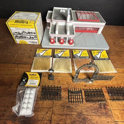 Sale Photo Thumbnail #199: An Assortment of O Scale Model Railroad Buildings and Scenery Accessories including Woodland Scenics and K-Line