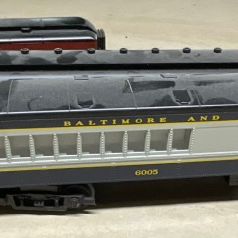 Sale Photo Thumbnail #94: Three O-Gauge Model Train Passenger Cars including Baltimore and Ohio, Great Northern, and Pennsylvania Railroad