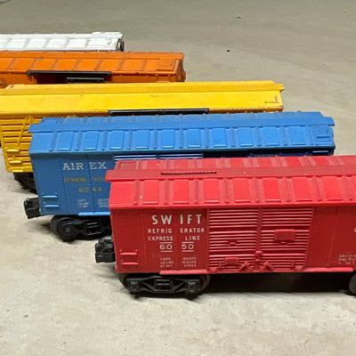 Sale Photo Thumbnail #105: A Collection of Five Vintage Lionel O-Gauge Freight Cars