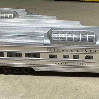 Sale Photo Thumbnail #109: A Set of Five Lionel Postwar O-Gauge Passenger Cars