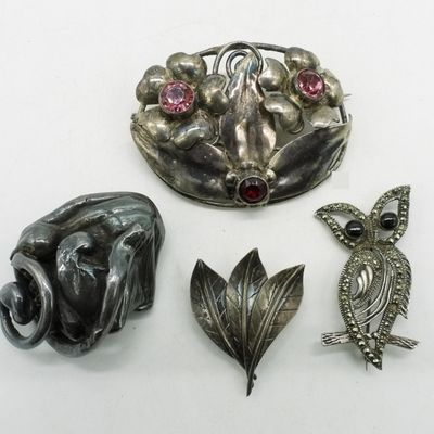 Four Sterling Brooches