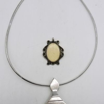 Two Sterling Bone Pendants