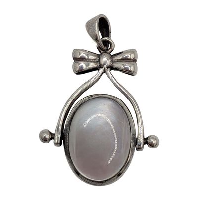 Sterling Silver Onyx Mother Of Pearl Bow Flip Pendant