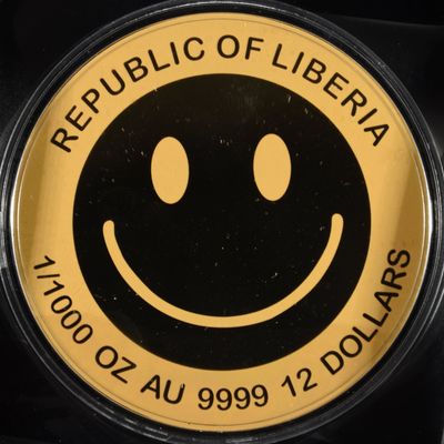Sale Photo Thumbnail #415: 2026 REP OF LIBERIA SMILEY 1/1000TH OZ .9999 GOLD