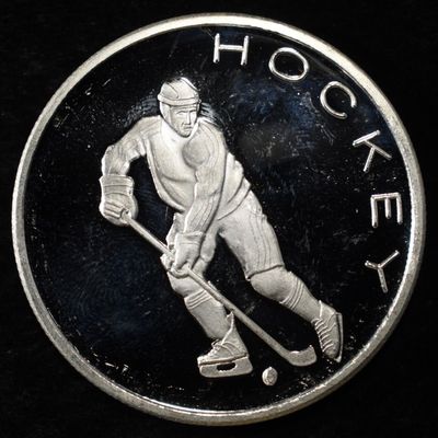 HOCKEY 1 OZ .999 SILVER ROUND