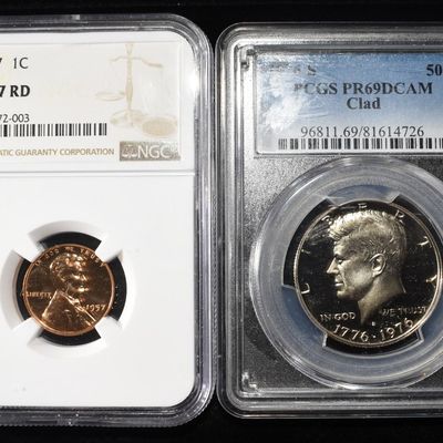 (2) GRADED COINS