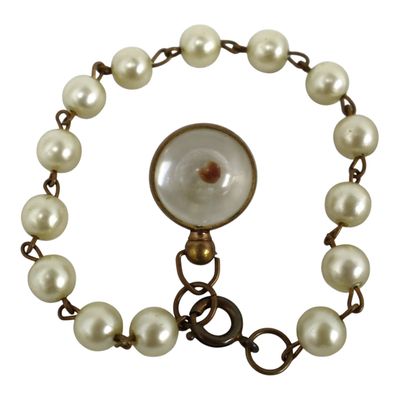 Sale Photo Thumbnail #294: Faux pearl bracelet object in glass orb