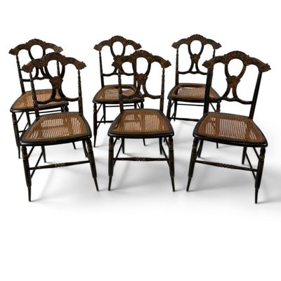 Sale Photo Thumbnail #210: Six Ebonized Floral Cane Seat Chairs
