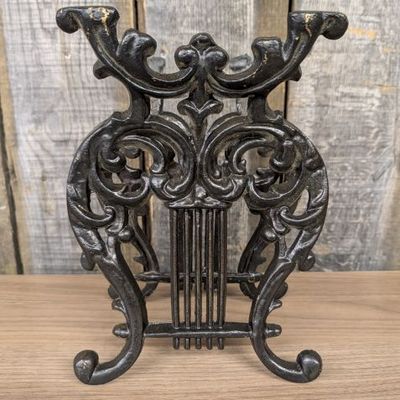 Sale Photo Thumbnail #190: Cast Iron Lyre Form Magazine Rack