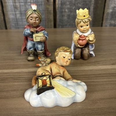 Sale Photo Thumbnail #29: A Trio of Goebel M.I. Hummel Porcelain Figurines Including Two Kings and Searching Angel