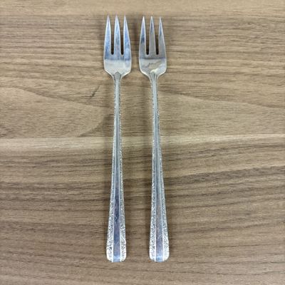 Sale Photo Thumbnail #426: A Pair of Towle Sterling Silver Cocktail Forks in the Candlelight Pattern