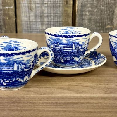 Sale Photo Thumbnail #397: Four Blue and White Transfer-Printed Earthenware Teacups and One Saucer Featuring Windsor Castle
