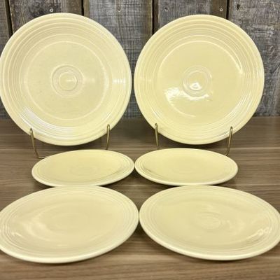 Sale Photo Thumbnail #349: A Set of Six Homer Laughlin Fiesta Yellow Glazed Ceramic Plates