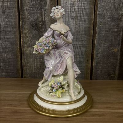 Sale Photo Thumbnail #7: Capodimonte Cesare Villari Porcelain Figurine of a Seated Lady with Flower Basket
