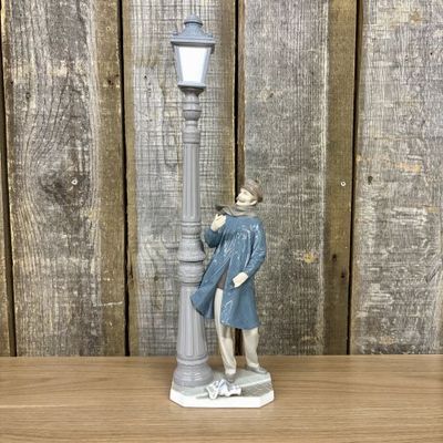 Sale Photo Thumbnail #50: Lladro Glazed Porcelain Figurine The Lamplighter Model 5205