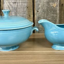 Sale Photo Thumbnail #337: A Pair of Vintage Turquoise Fiestaware Serving Pieces including Lidded Casserole and Gravy Boat